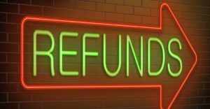 Customer carefully reviewing an IPTV subscription refund policy and payment options before completing an online purchase, illustrating can I get a refund if my IPTV subscription doesn't work.